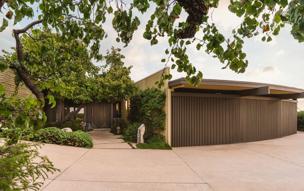 Prime Trousdale Estates Home. Stunning exterior Mid Century design in this Home by Raul F. Garduno
