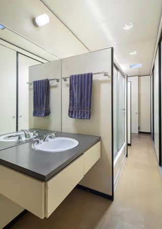 Primary bathroom features clean lines and contemporary design.