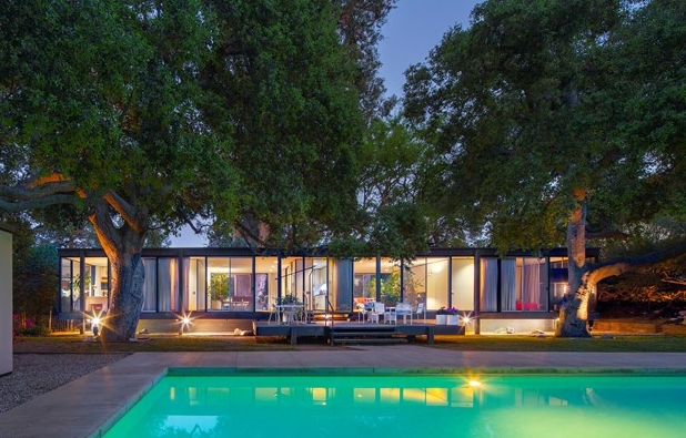 Night time poolside romantic escape in this classic Craig Elwood home.
