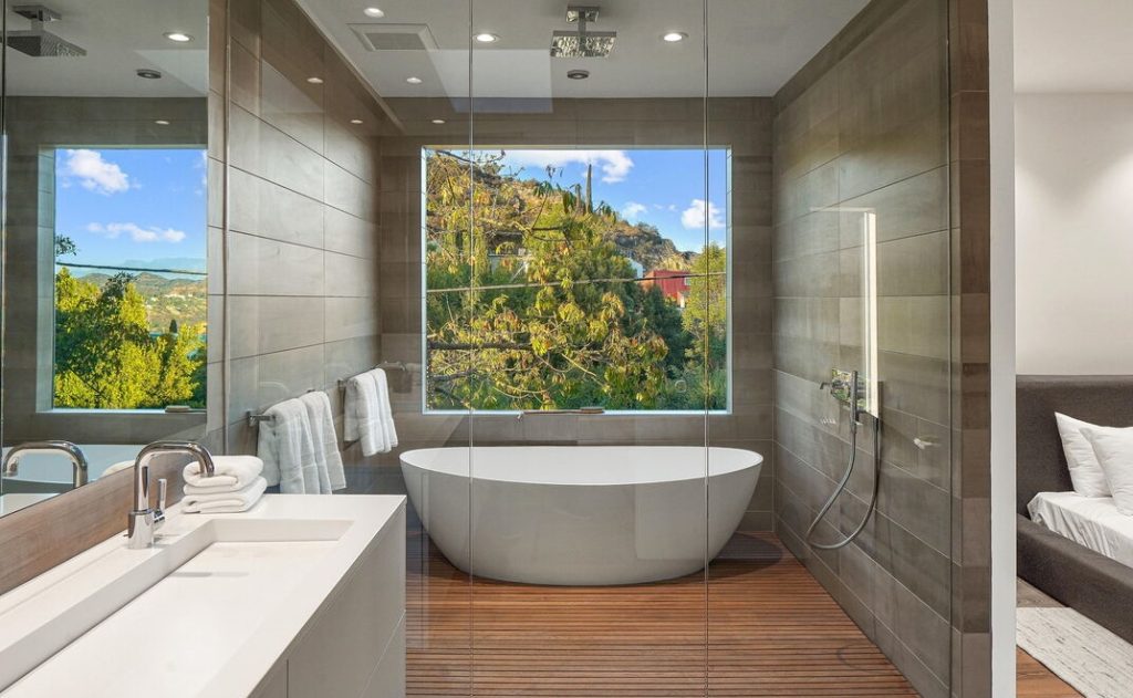 Incredible over-sized glass enclosed tub with breathtaking views.