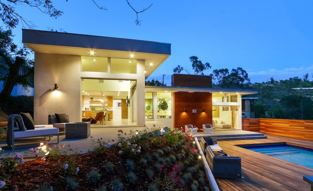 Poolside views look into this remarkable architectural dream home.