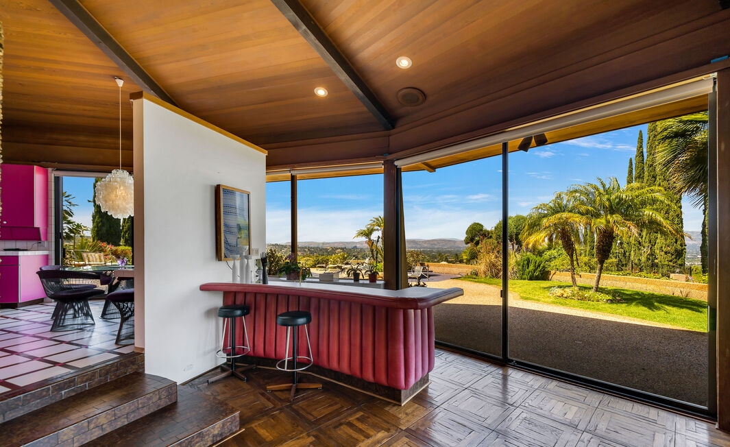 Incredible chef's kitchen meticulously designed to showcase sweeping panoramic views.