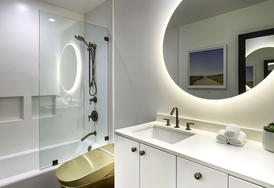 Wonderful contemporary bathroom with dynamic lighting fixture.