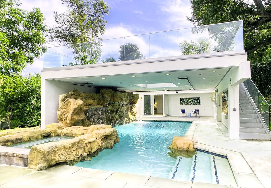 Prime location in Encino's Rancho Estates Amazing outdoor oasis with magnificent waterfall pool and overhead sun deck