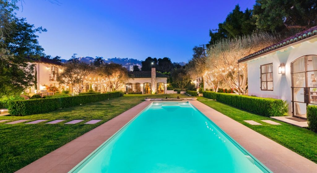 Incredible West Hollywood designer compound like nothing seen before. Sparkling pool and lush green landscaping enhances the grounds.