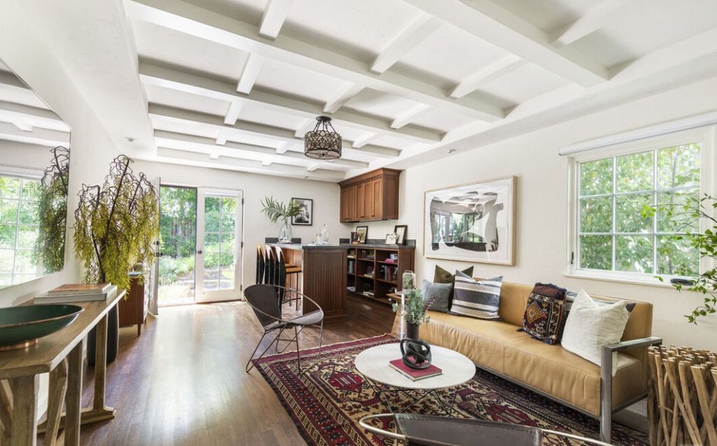Los Feliz Historic dream house with uniquely crafted ceilings living area with wet bar opens to yard.