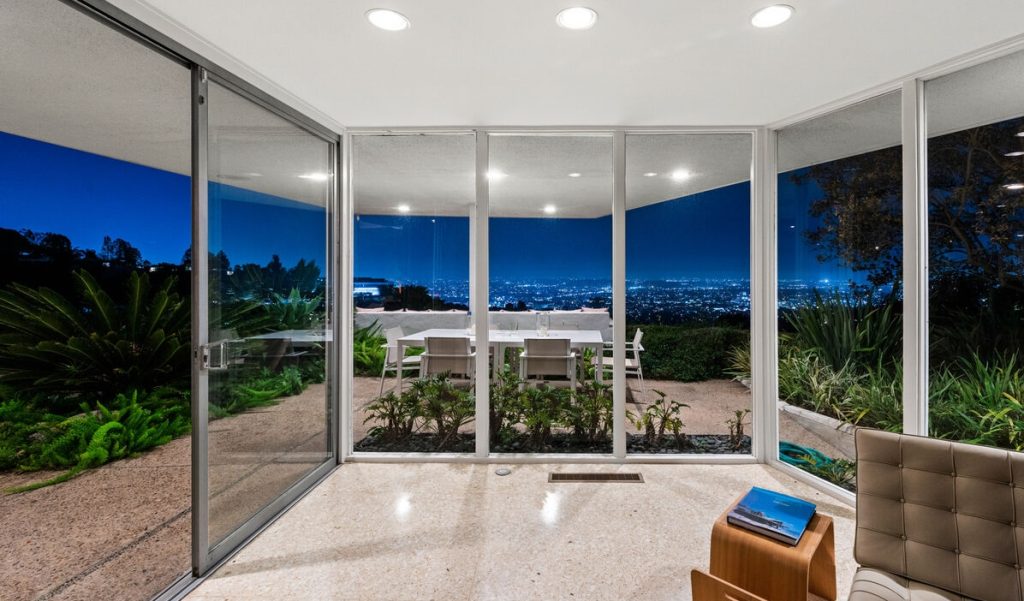 Beverly Hills Architectural Masterpiece provide grand walls of glass for breathtaking views.