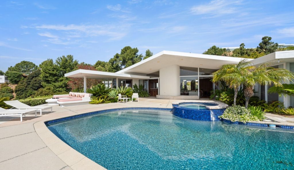 Magnificent pool views and grand rear yard for ultimate entertainment.