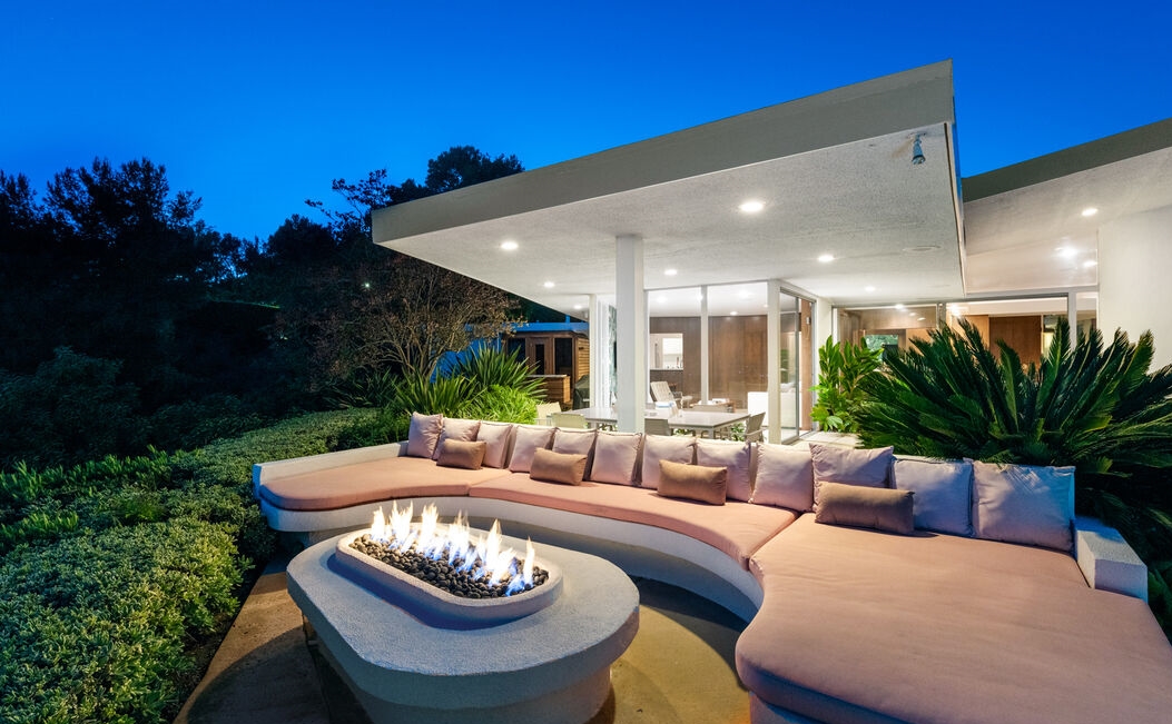Beverly Hills Architectural Masterpiece with grand outdoor fire pit and seating area