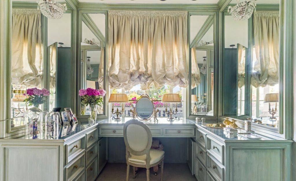 Luxury Spanish Unbelievable vanity area with walls of mirrors custom design