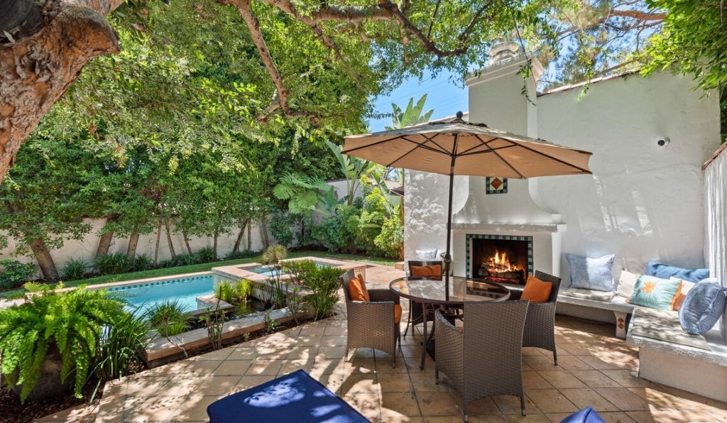 Hollywood Hills Unique Spanish Colonial offer amazing rear yard fireplace entertainment area