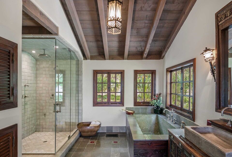 Classic Spanish Architectural Stunning Sunset Strip home with Magnificent beamed ceilings in huge bathroom with glass enclosed shower an luxurious soaking tub