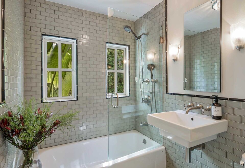 Wonderful secondary bathroom clean lines and natural light