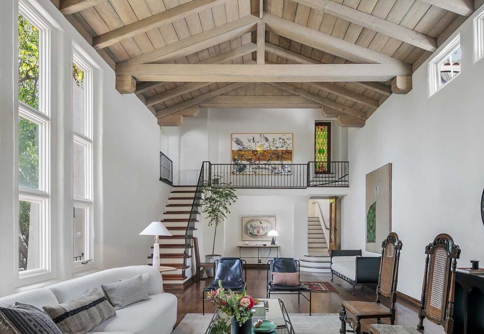 Classic Spanish Architectural Stunning Sunset Strip home features Magnificent high beamed ceilings in huge classic Spanish Living Room