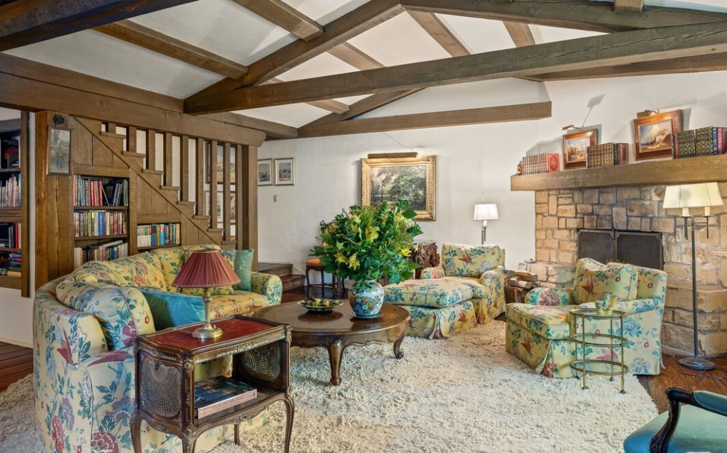 Bel Air Luxury Spanish Incredible Old World Charm in these open living spaces with brilliant beamed ceilings and custom stone fireplace