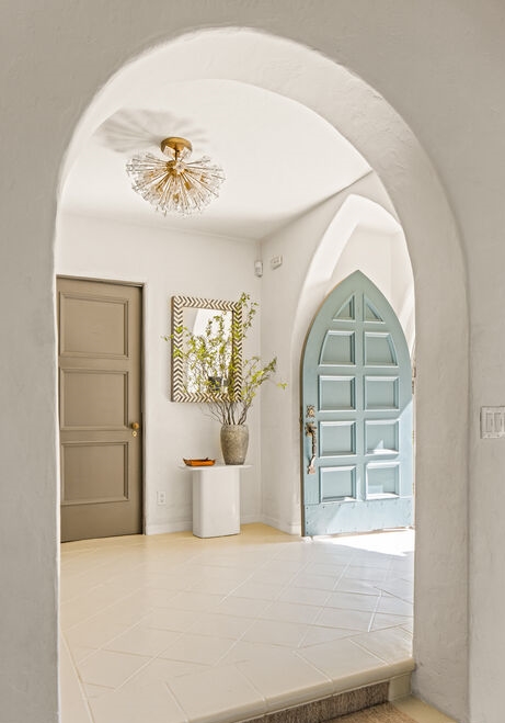 Hollywood Hills Spanish Old World Charm foyer entrance with decorative archways.