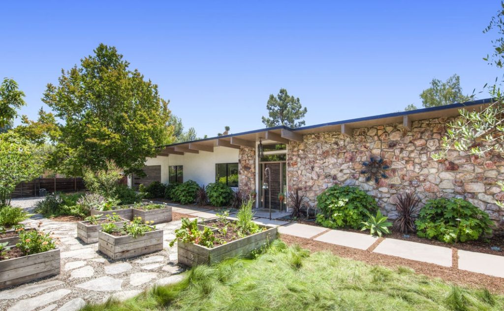 Great stone faced front in this Fabulous geometric shaped pool in this Altadena Architectural Exceptional Post and Beam Modern Home. 