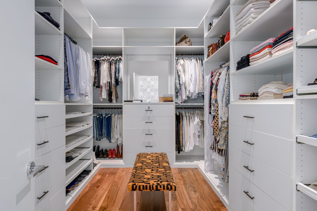 Hollywood Hills Exceptional custom closet with amazing builtin cabinets and hanging spaces
