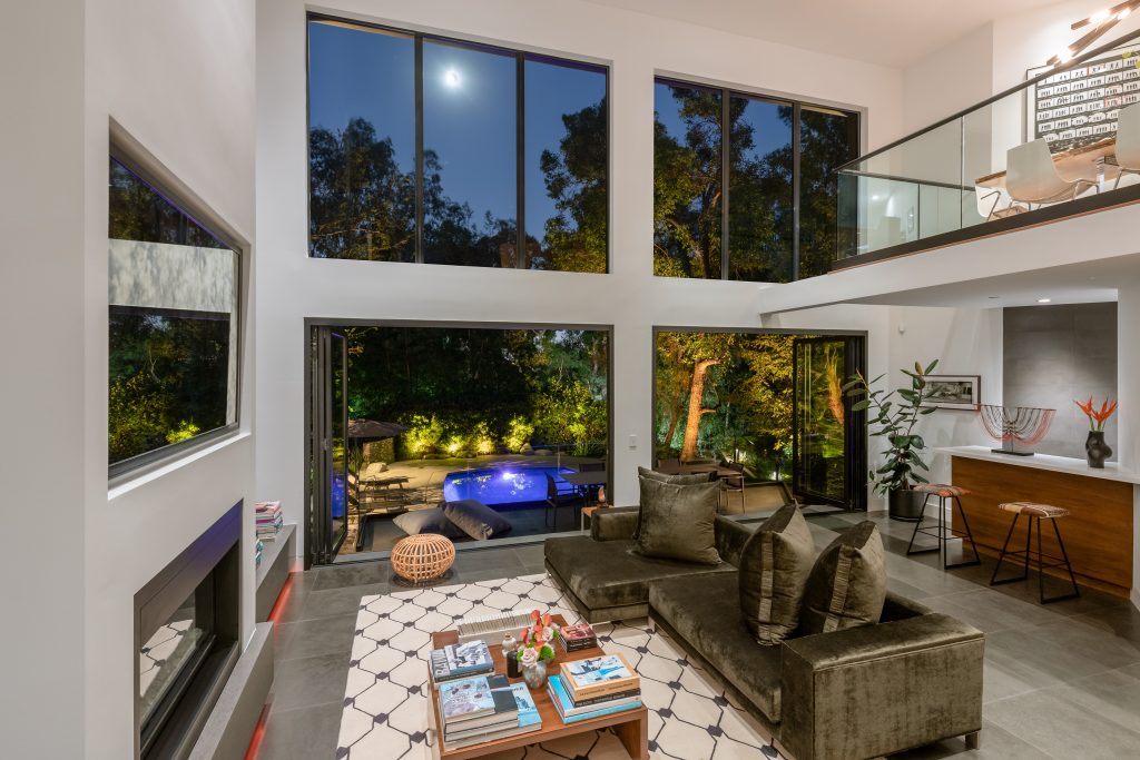 Hollywood Hills Exceptional Gated and Secluded Modern Home features fabulous angles, walls of glass and multi-levels.