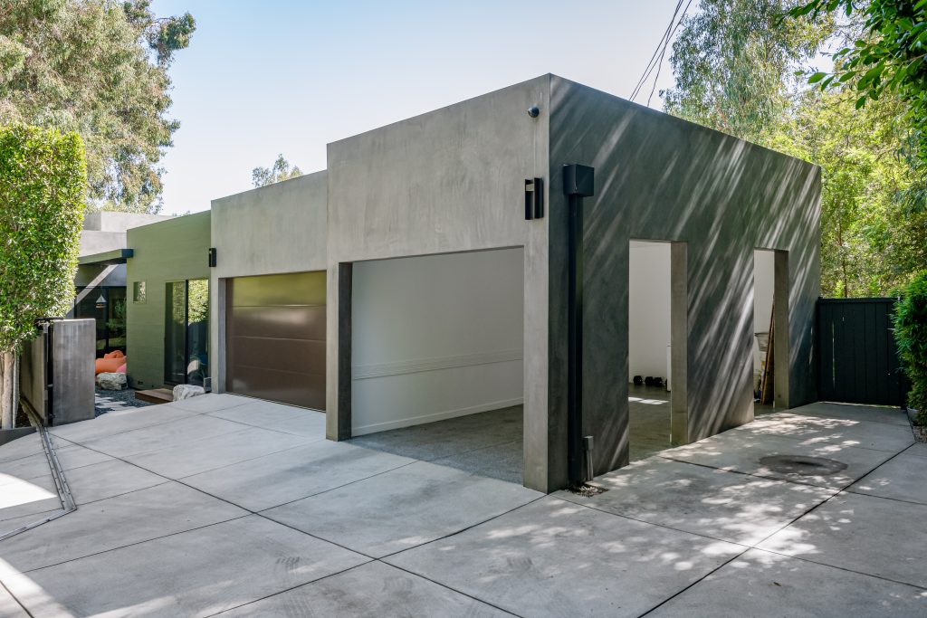 Same architectural design in the multiple garages in this Hollywood Hills Exceptional Gated and Secluded Modern Home