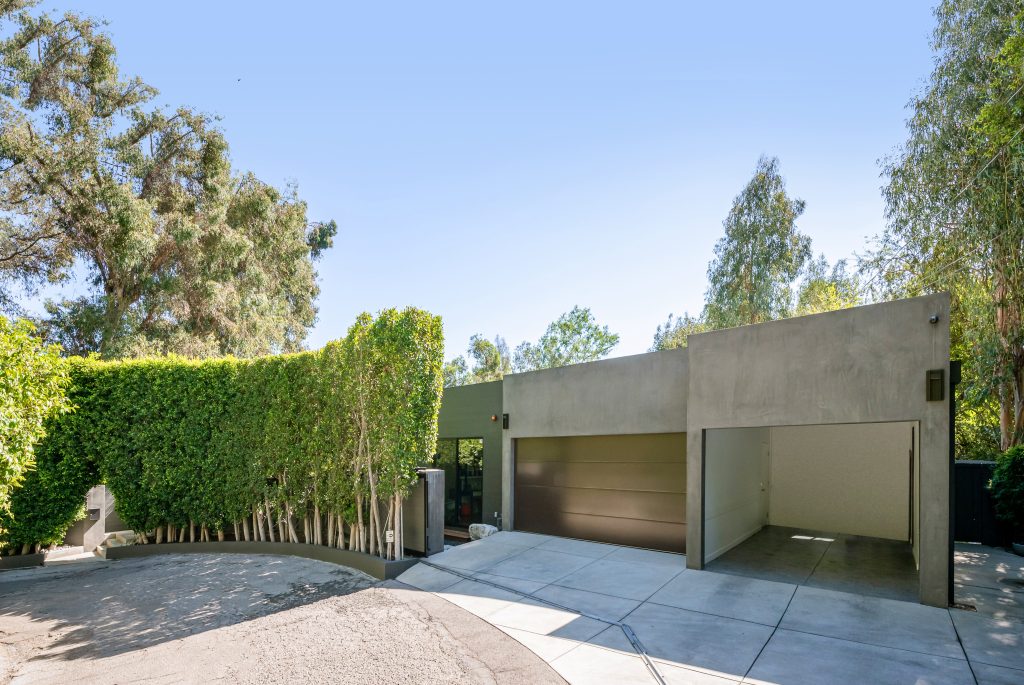 Same architectural design the these multiple garages in this Hollywood Hills Exceptional Gated and Secluded Modern Home