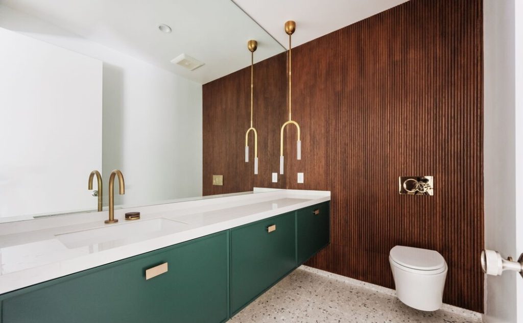 Clean lines and custom cabinetry and white walls in this architectural bathroom.