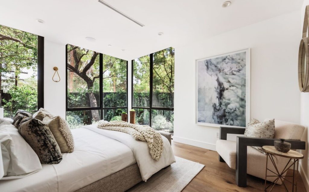 Spacious secondary bedroom with windows bringing in tons of natural light