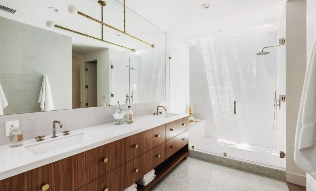 Clean lines and white walls in this architectural bathroom.
