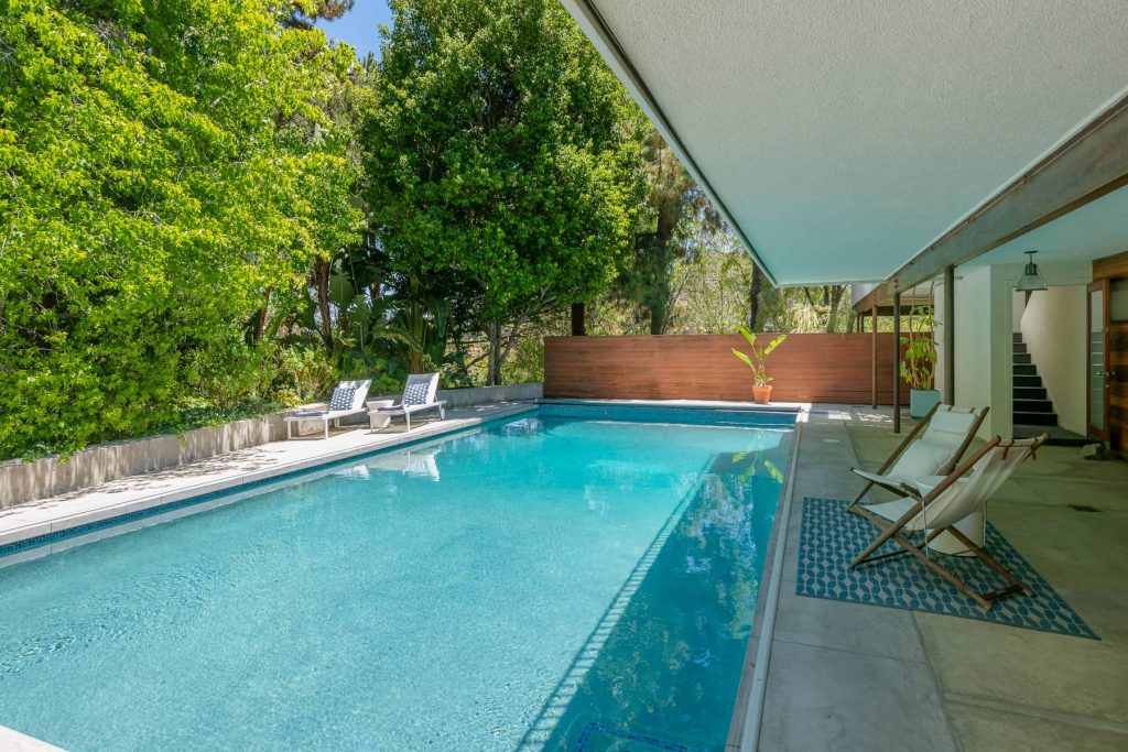 Sparkling pool yard in this remarkable Hollywood Hills Dike Nagano Mid-Century Modern Home