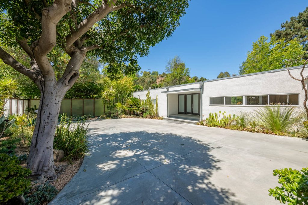 Dike Nagano, AIA - 1962. Up a semi private drives lies this gated and private mid-century modern home.