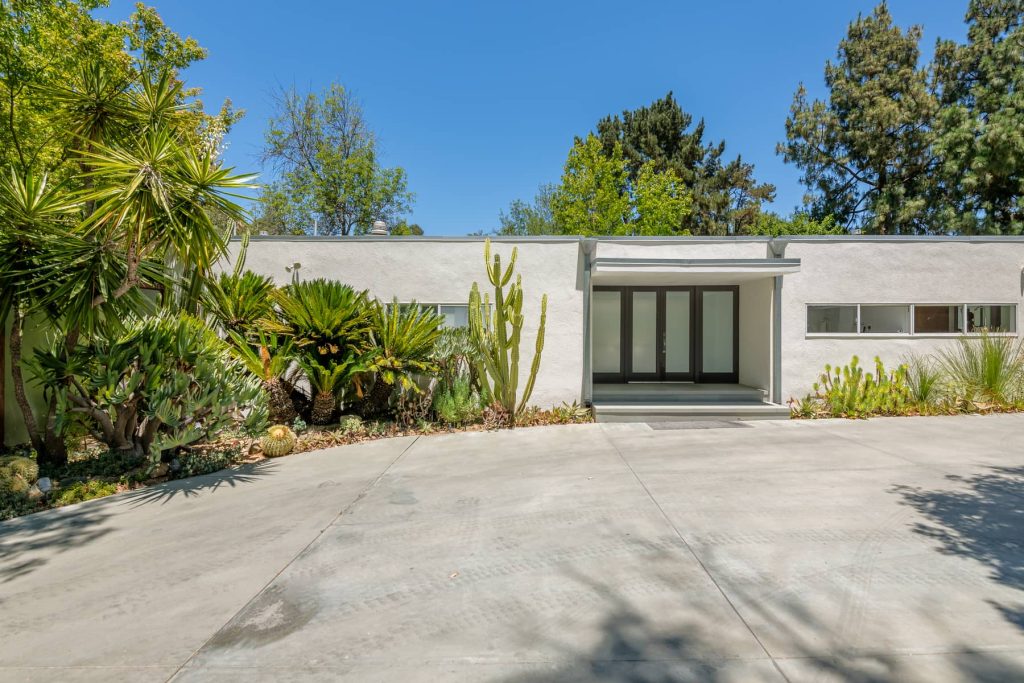 Dike Nagano, AIA - 1962. Up a semi private drives lies this gated and private mid-century modern home.