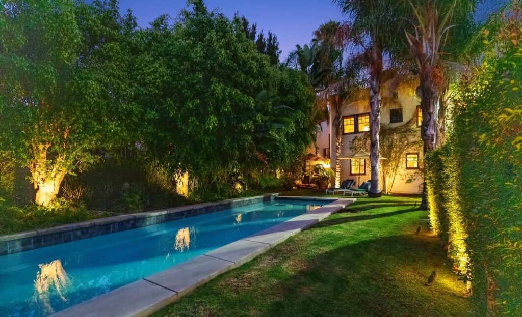 Remarkable pool yard in this Hancock Park Classic Spanish Mediterranean home