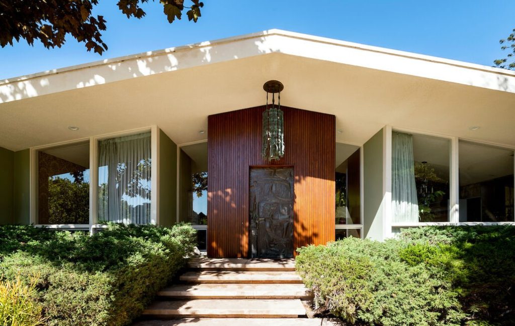 Dramatic entry in this Beverly Hills Brilliant Mid Century Architectural