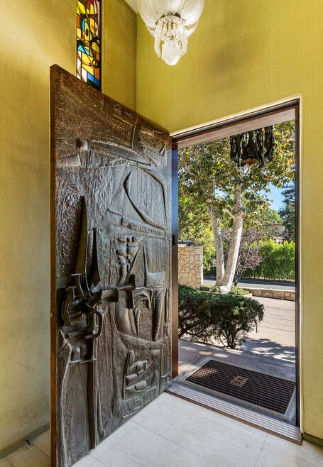 Dramatic entry in this Beverly Hills Brilliant Mid Century Architectural