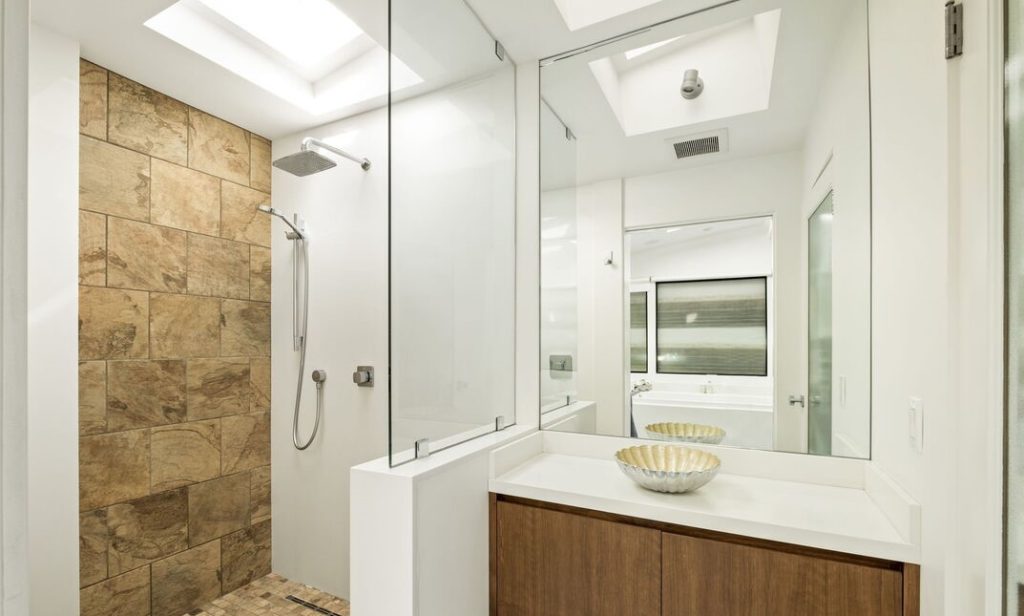 Clean lines and white walls in this architectural bathroom. 