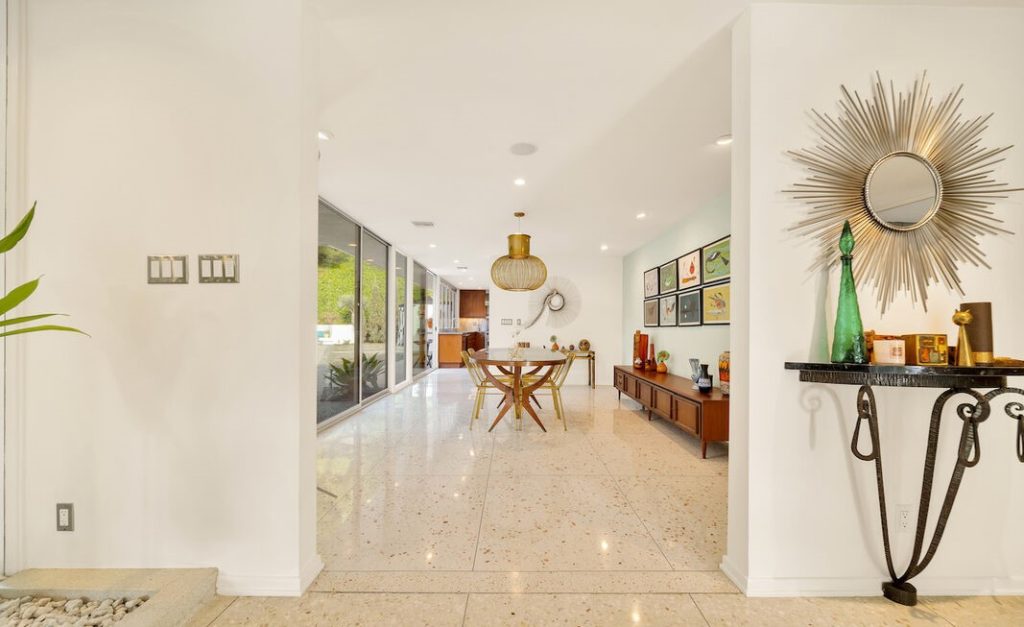 Trousdale Estates Mid-Century Modern home with walls of glass and terrazzo floors.