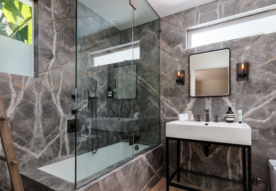 Magnificent mid-century bathroom with glass enclosed shower