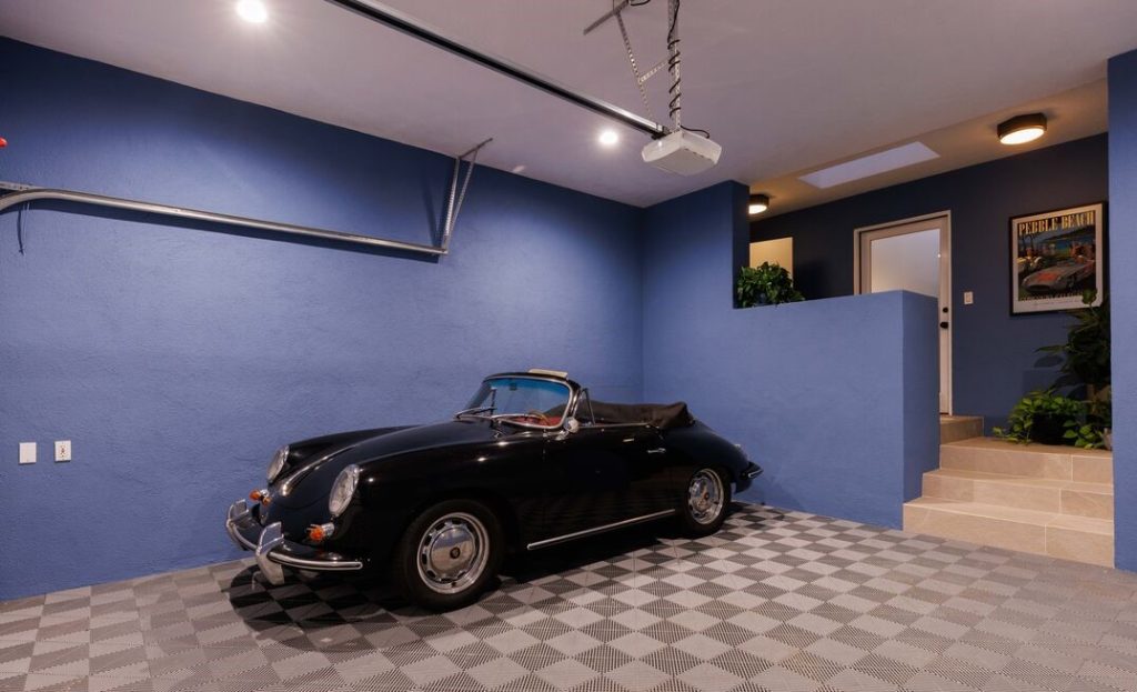Magnificent custom garage with dramatic indoor outdoor open flow.
