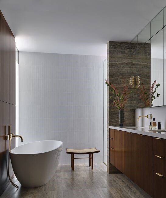 BHPO Mid-Century Gem "La Casa Bea” classic white and freestanding tub primary bathroom