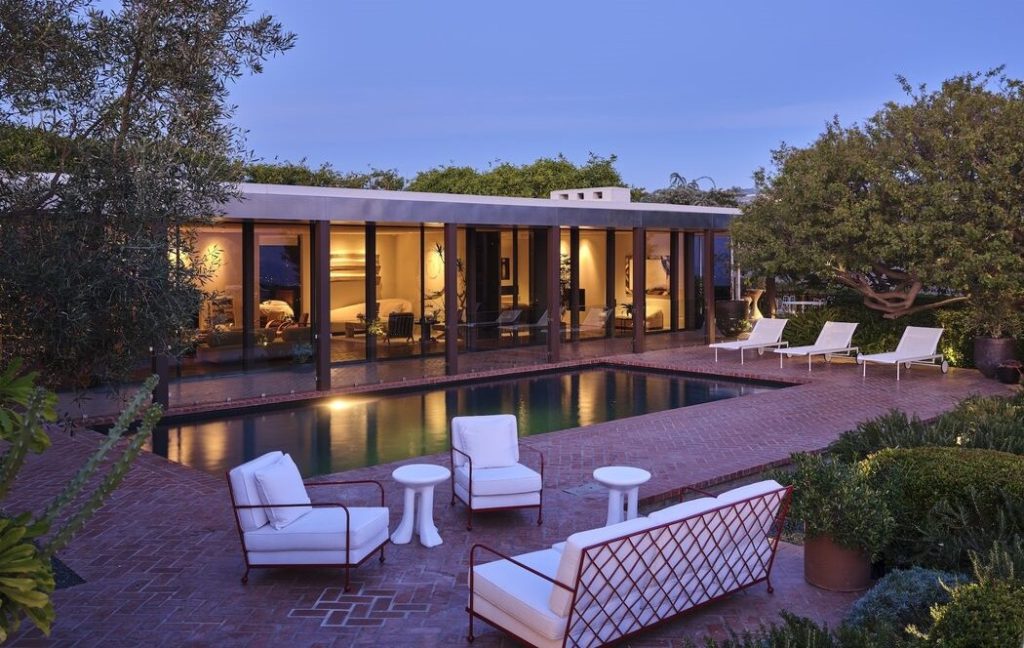 Sparkling pool yard in this BHPO Frank Weber Marmol Radziner re-imagined Mid Century home.