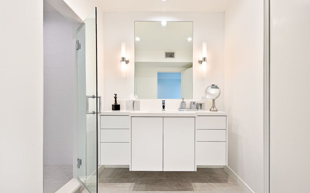 separate den/office with bath, a primary suite boasts double walk-in closets , a dressing area, numerous built-ins and sunlit spa-like bathroom with freestanding tub