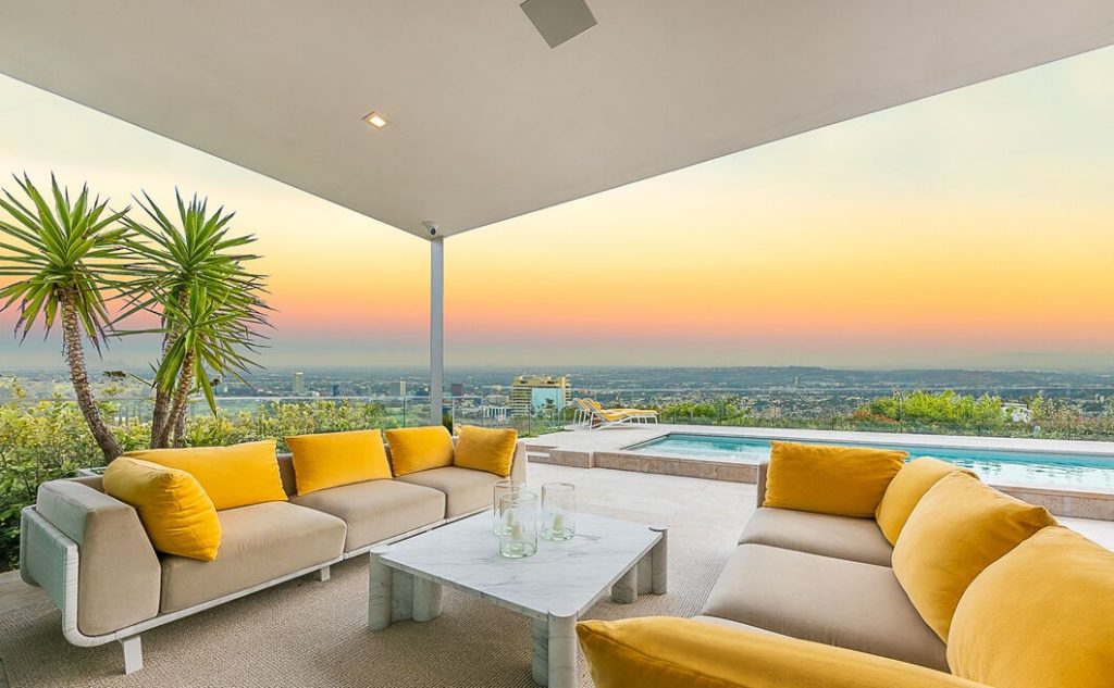 Trousdale Mid-Century Gem Jetliner Views with expansive pool and spa overlooking downtown LA to Catalina island!