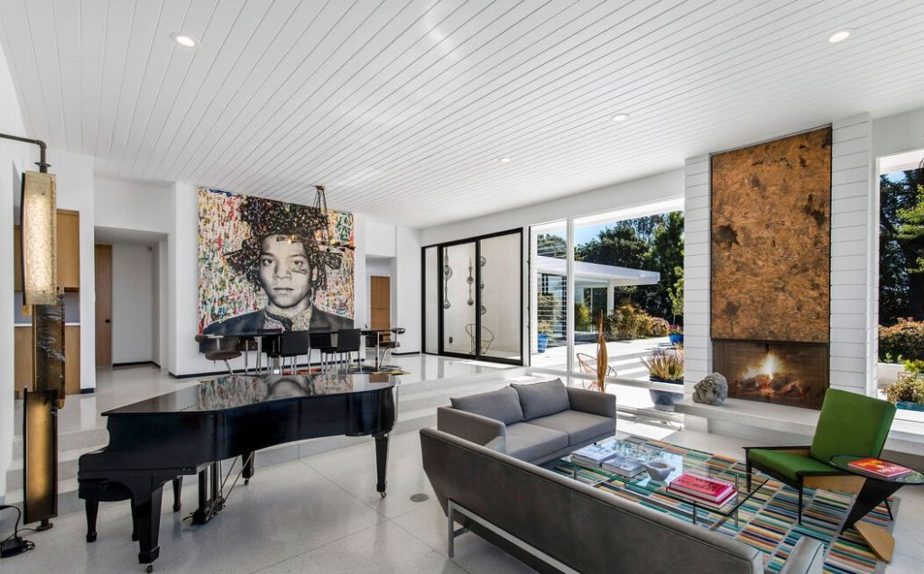Flooded with natural light, the open flooplan and floor-to-ceiling windows showcase the magnificent panoramic views from nearly every room.