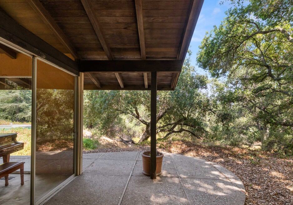 Concrete walkways and glass walls expertly connect the surrounding natural elements to create unsurpassed privacy and tranquility.