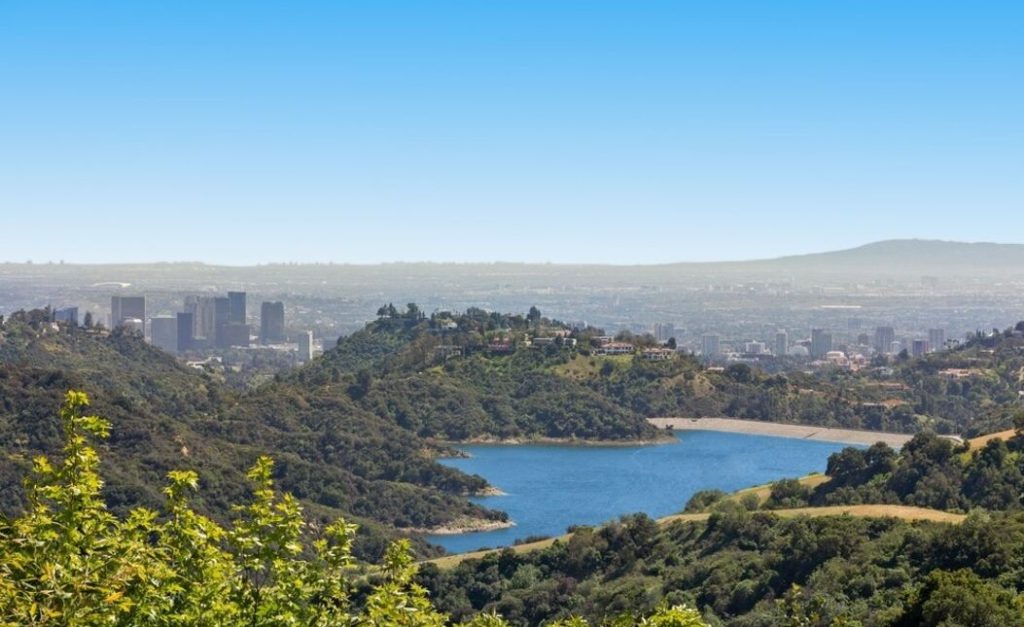 Sweeping ocean, city, Stone Canyon reservoir and shimmering valley views.. Bel Air Wilt Chamberlain’s “Ursa Major “