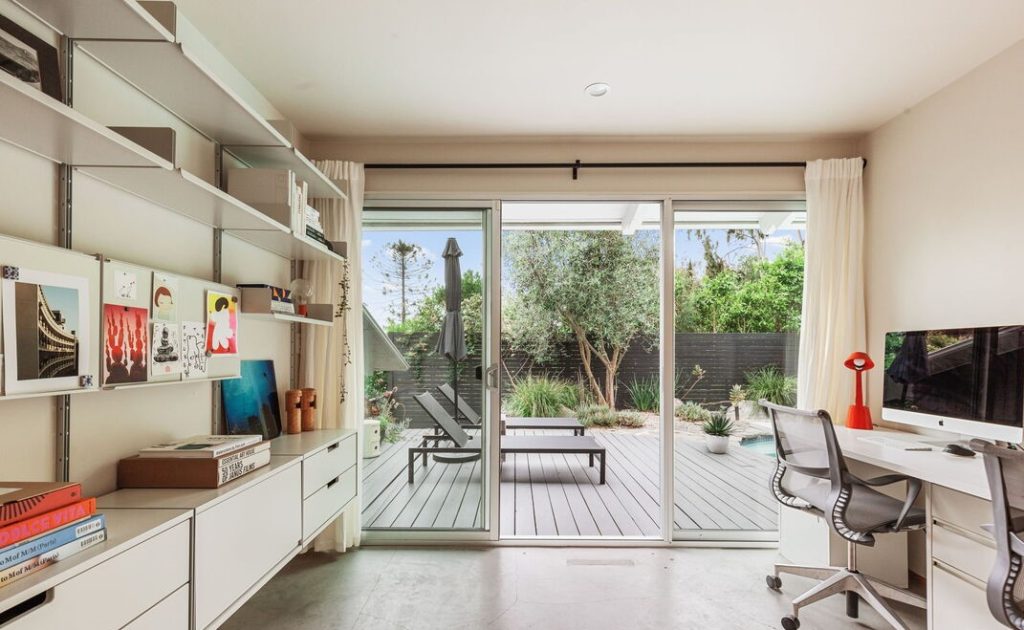 Breathtaking and bright, with fantastic indoor/outdoor flow, the open-plan common space features soaring ceilings, multiple skylights, concrete floors and countless architectural details.