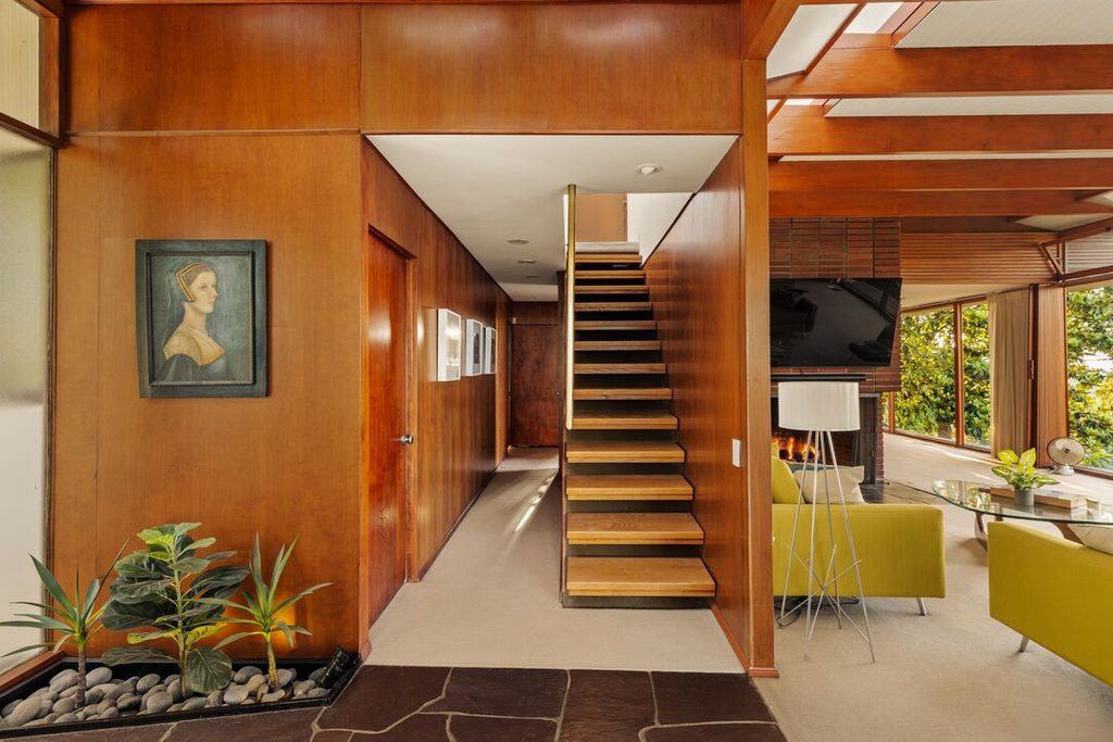 The Asher Residence circa by Case Study architect Rodney Walker. Large volume spaces with rows of glass windows set the tone for this mid-century post and beam in Sherman Oaks. Classic redwood finishes and flagstone flooring add to the romance of this custom built 1949 home.